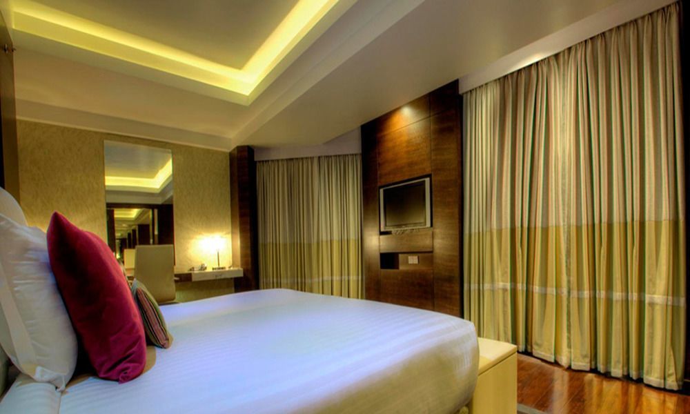 Avari Towers Karachi Luaran gambar A bedroom at the Taj Bengal